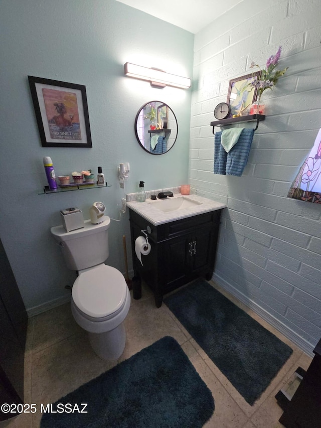 half bath featuring toilet and vanity