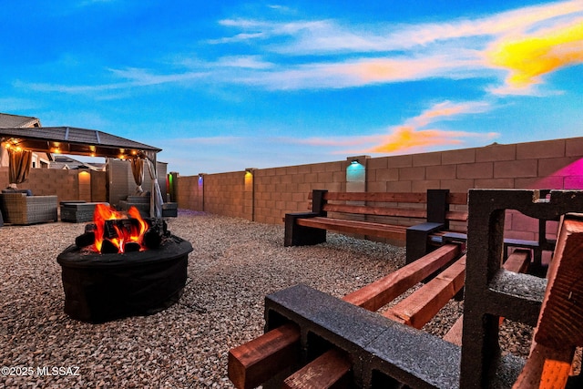 10150 S Rolling Water Dr, Vail, AZ 85641 - view of yard featuring a fenced backyard and a fire pit