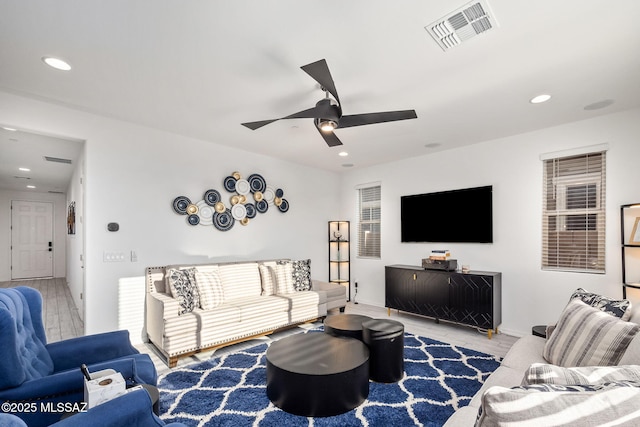 10150 S Rolling Water Dr, Vail, AZ 85641 - living room featuring ceiling fan, wood finished floors, visible vents, and recessed lighting