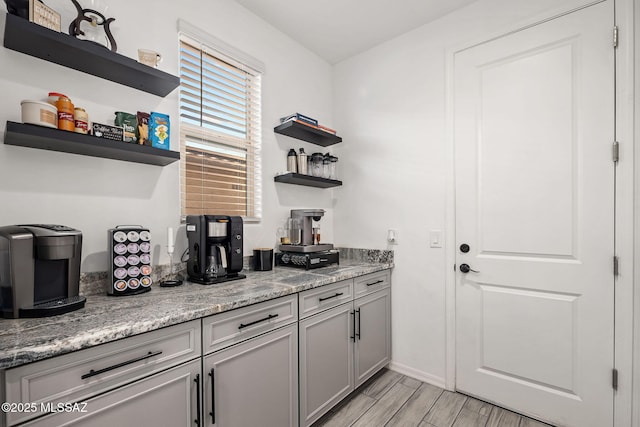 10150 S Rolling Water Dr, Vail, AZ 85641 - bar featuring light wood-type flooring