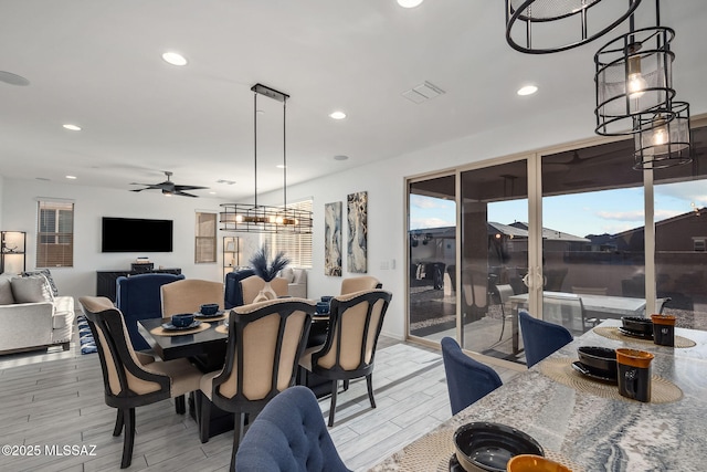 10150 S Rolling Water Dr, Vail, AZ 85641 - dining area featuring visible vents, wood tiled floor, ceiling fan, and recessed lighting