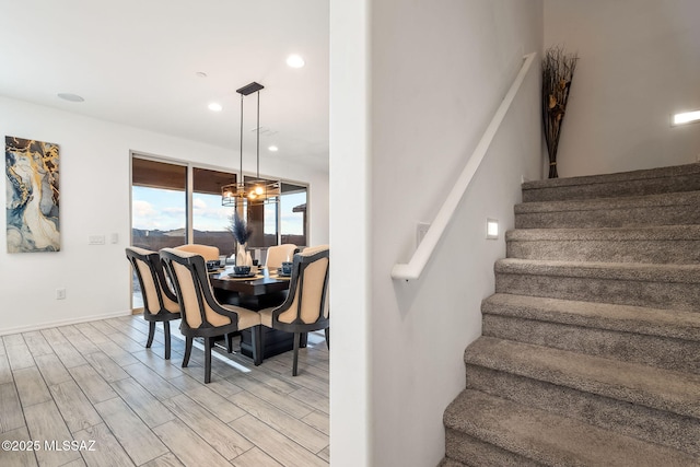 10150 S Rolling Water Dr, Vail, AZ 85641 - stairs featuring baseboards, a notable chandelier, recessed lighting, and wood finished floors