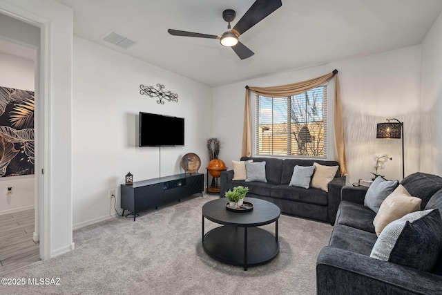 10150 S Rolling Water Dr, Vail, AZ 85641 - carpeted living room featuring ceiling fan, baseboards, and visible vents