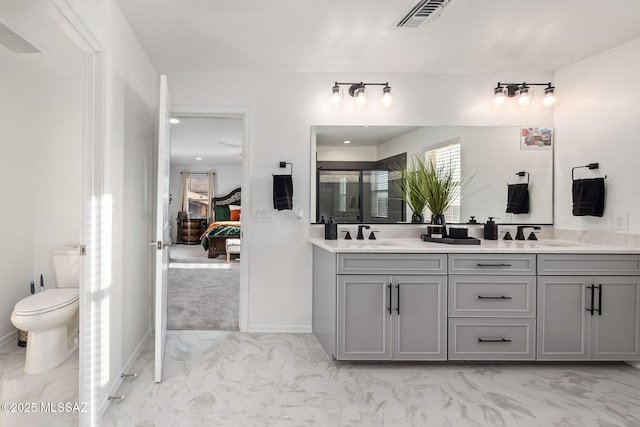 10150 S Rolling Water Dr, Vail, AZ 85641 - ensuite bathroom featuring marble finish floor, ensuite bath, visible vents, a sink, and double vanity