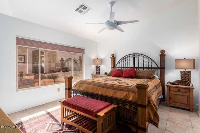 bedroom with light tile patterned flooring, ceiling fan, and visible vents