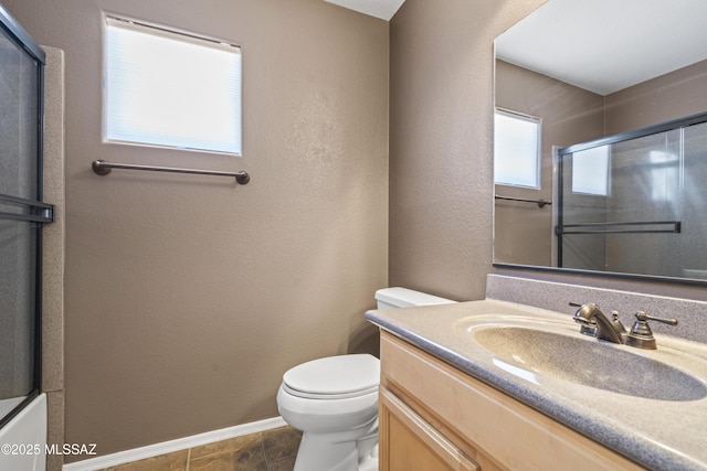 full bath featuring toilet, a shower with shower door, a textured wall, and vanity