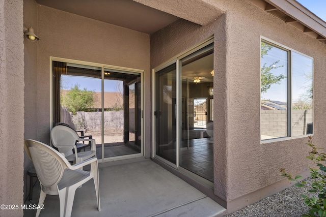 property entrance featuring stucco siding