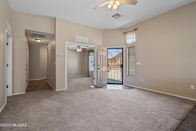 empty room with visible vents and a ceiling fan