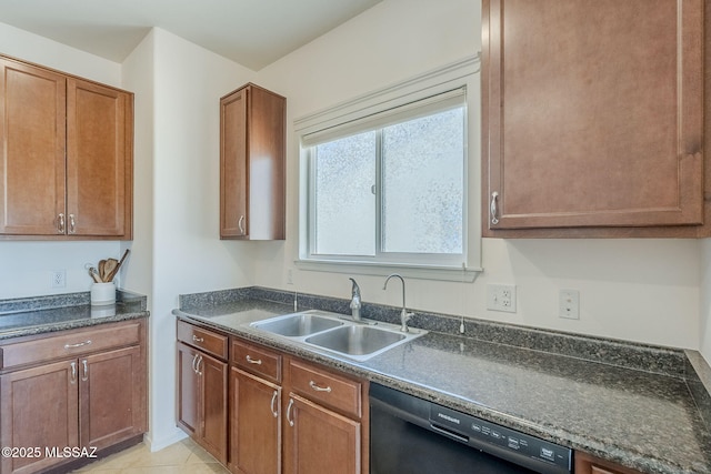 kitchen featuring a sink, brown cabinets, and dishwasher