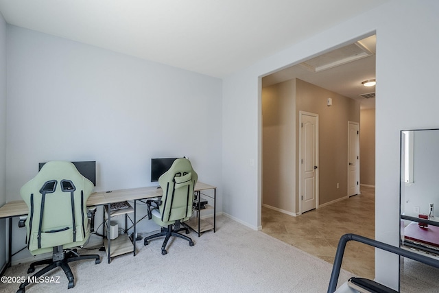 office with visible vents and baseboards