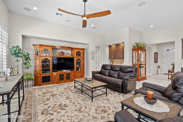 61663 E Talc St, Oracle, AZ 85623 - living room featuring ceiling fan with notable chandelier, baseboards, and recessed lighting