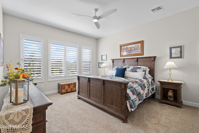 61663 E Talc St, Oracle, AZ 85623 - bedroom with light carpet, visible vents, and washer and dryer