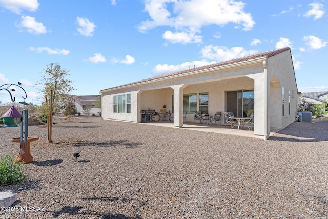61663 E Talc St, Oracle, AZ 85623 - view of front facade with stucco siding, a tile roof, fence, and a patio area