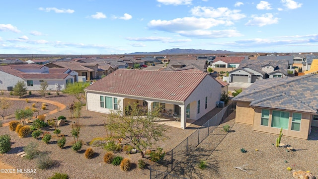 61663 E Talc St, Oracle, AZ 85623 - view of front facade featuring a garage, driveway, stucco siding, and a mountain view