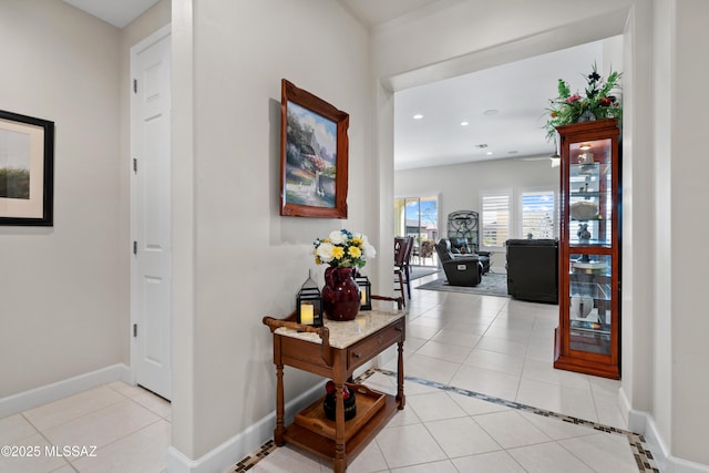 61663 E Talc St, Oracle, AZ 85623 - kitchen with under cabinet range hood, stainless steel appliances, light countertops, backsplash, and an inviting chandelier