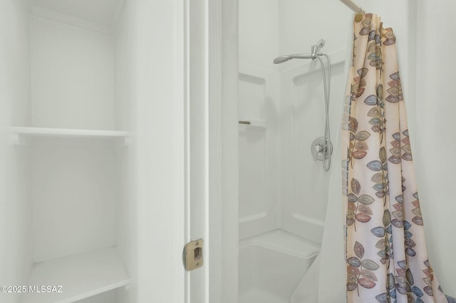 bathroom featuring a shower with curtain