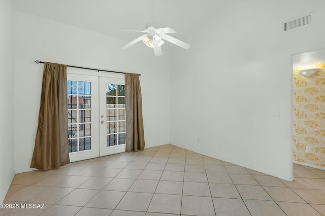 spare room with ceiling fan, visible vents, french doors, and light tile patterned floors