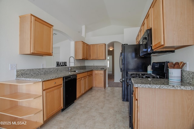 kitchen featuring vaulted ceiling, a sink, open shelves, black appliances, and arched walkways