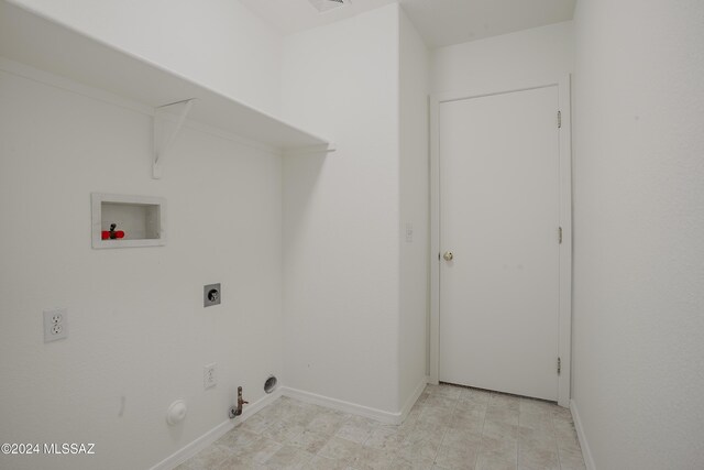 laundry room featuring hookup for a washing machine, hookup for an electric dryer, laundry area, baseboards, and gas dryer hookup