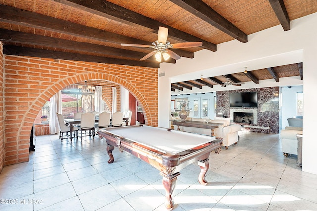 game room featuring a wealth of natural light, wood ceiling, beam ceiling, and ceiling fan