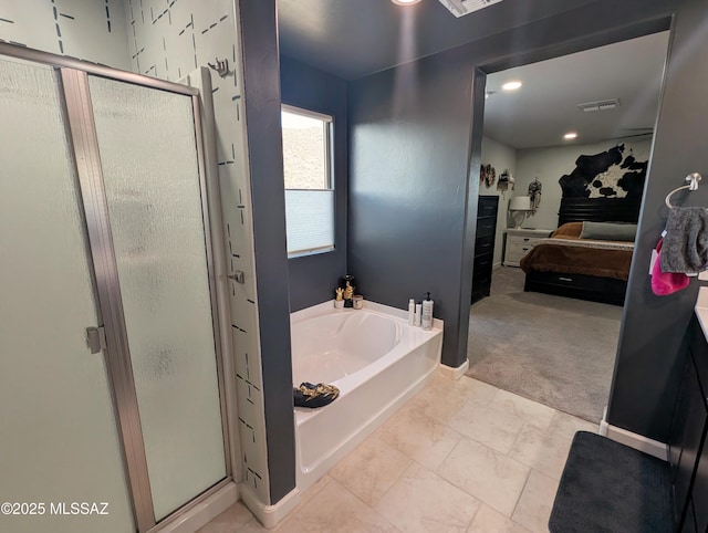 full bath with a shower stall, a bath, ensuite bathroom, and visible vents