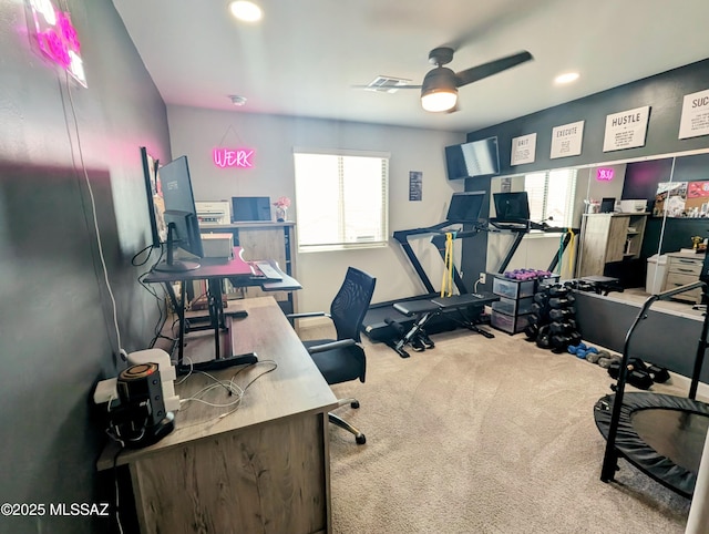 office space with a wealth of natural light, recessed lighting, a ceiling fan, and carpet floors