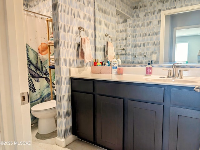bathroom featuring vanity, toilet, curtained shower, tile patterned floors, and wallpapered walls
