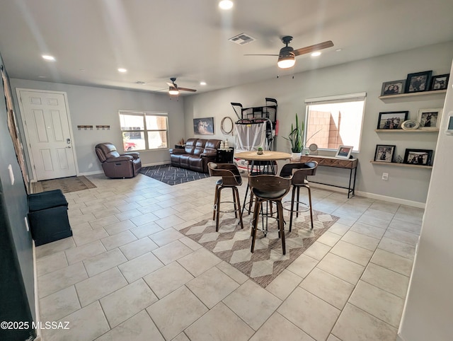 dining room featuring light tile patterned floors, ceiling fan, visible vents, recessed lighting, and baseboards