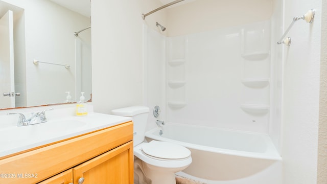 full bath with toilet, vanity, and shower / bathing tub combination