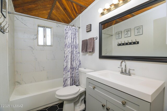 full bathroom featuring toilet, shower / bath combination with curtain, and vanity