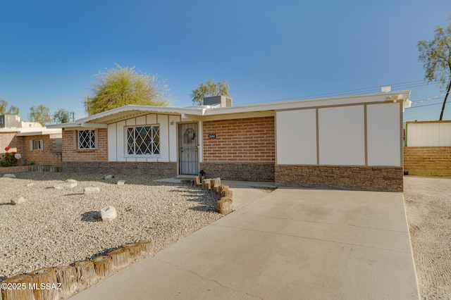 ranch-style home with brick siding