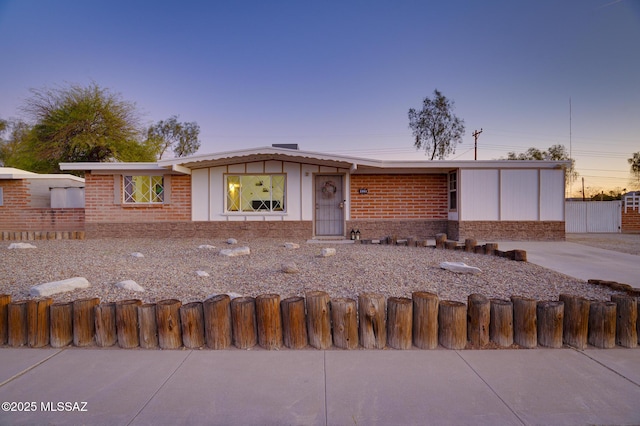 view of front of property with fence