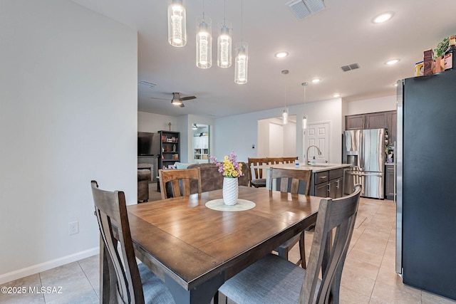 dining space featuring light tile patterned floors, recessed lighting, baseboards, and visible vents