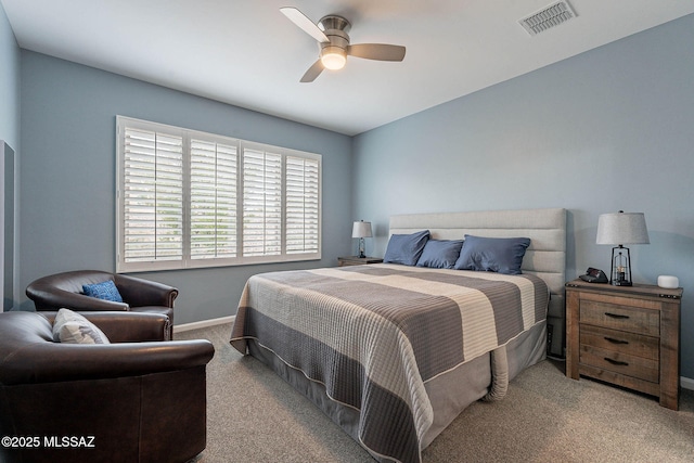 bedroom featuring baseboards, visible vents, ceiling fan, and carpet floors