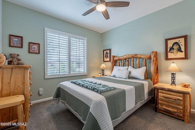 carpeted bedroom featuring baseboards and a ceiling fan