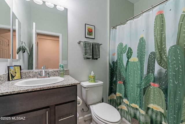 full bath featuring toilet, a shower with shower curtain, and vanity