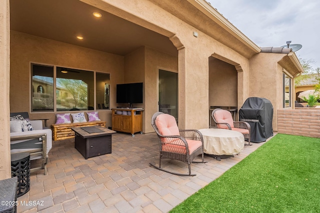 view of patio with outdoor lounge area and area for grilling