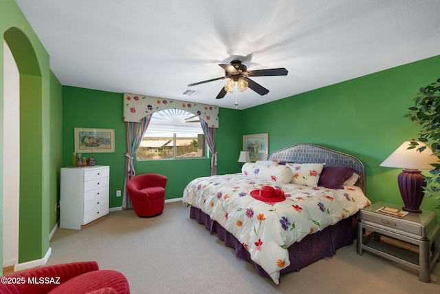 39425 S Mchaney Ct, Tucson, AZ 85739 - carpeted bedroom featuring baseboards, ceiling fan, and visible vents