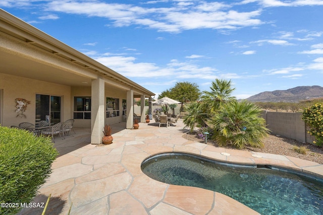 39425 S Mchaney Ct, Tucson, AZ 85739 - view of pool with a fenced backyard, a mountain view, and a patio area