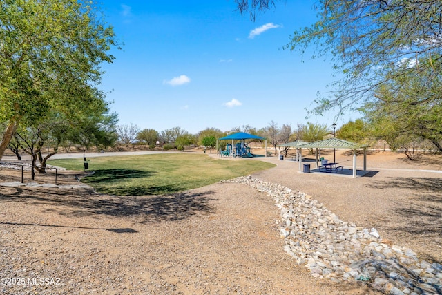 view of yard featuring a gazebo and playground community