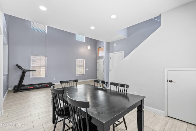 dining room with baseboards, visible vents, and recessed lighting