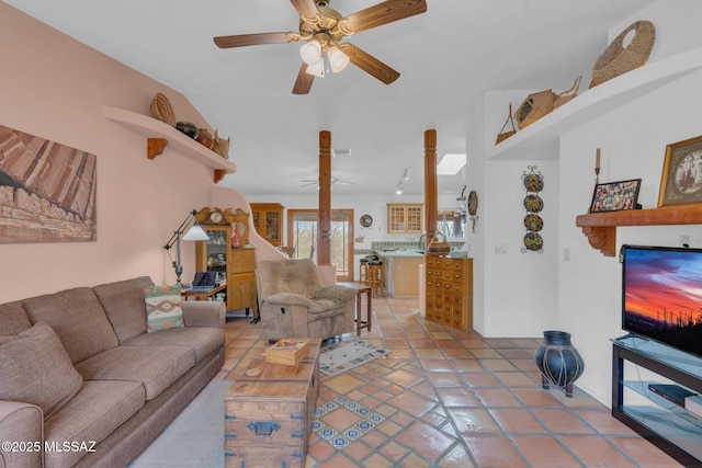 living room with ceiling fan