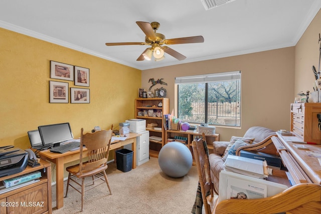 office space with carpet floors, visible vents, a ceiling fan, and ornamental molding