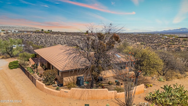 birds eye view of property with a mountain view