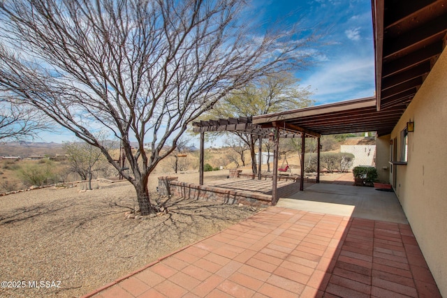 view of patio / terrace with a pergola
