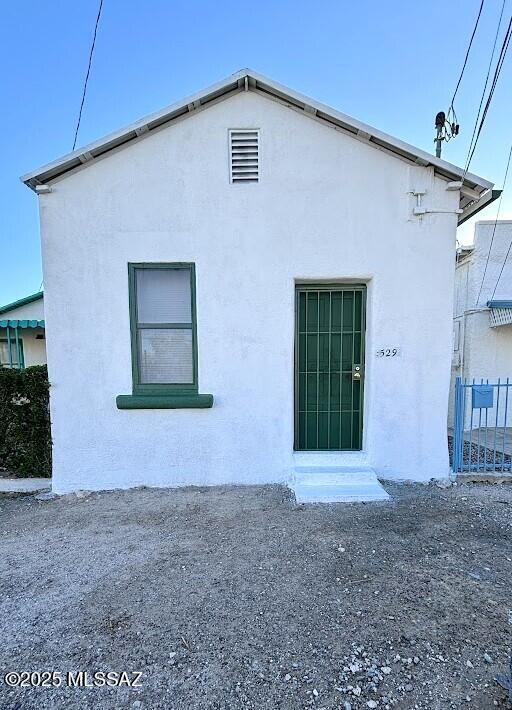 view of property exterior with stucco siding