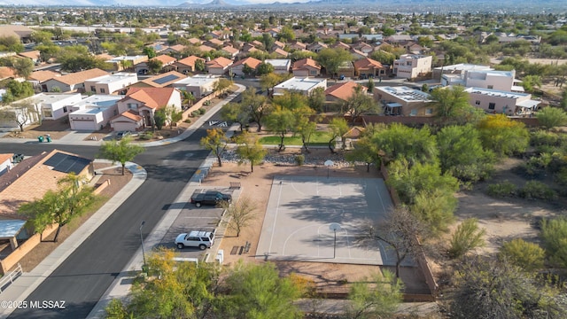 birds eye view of property featuring a mountain view and a residential view