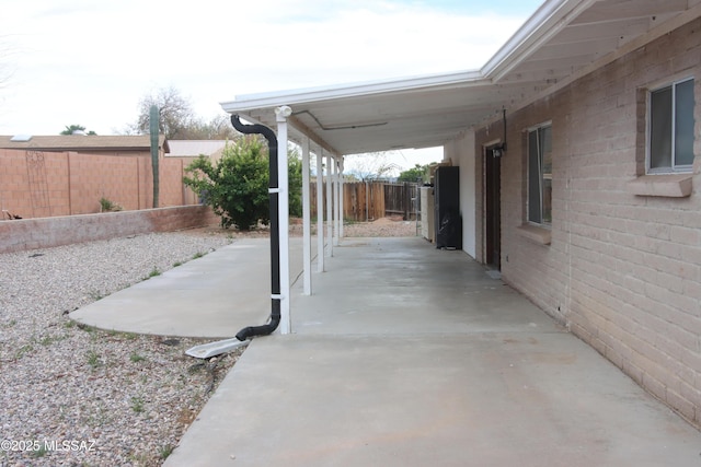 view of patio with fence