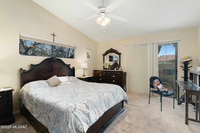 bedroom with a ceiling fan, light colored carpet, and vaulted ceiling