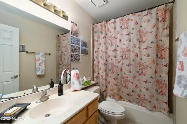 bathroom with toilet, shower / bath combo, and vanity